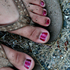 Flipflop feet in the gravel off Kakawa Lake