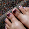 Bare feet on the stairs